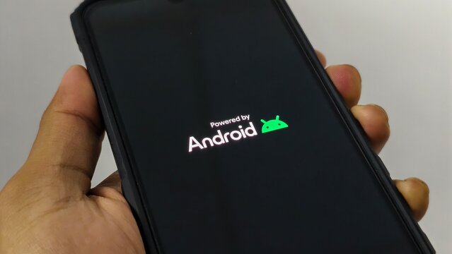 Ipoh,Malaysia - 05 July 2026: Smartphone restarting with the Android logo displayed on the screen, indicating the device is booting up after a restart or system reboot process.