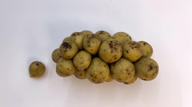 Fresh Longkong Fruits Piled on White Background