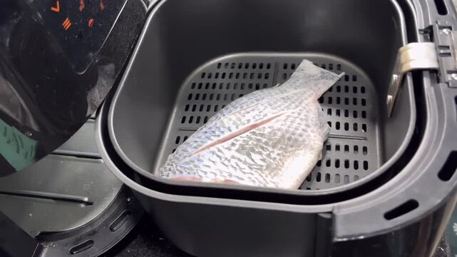 Steps for frying batter-coated tilapia in an air fryer.
