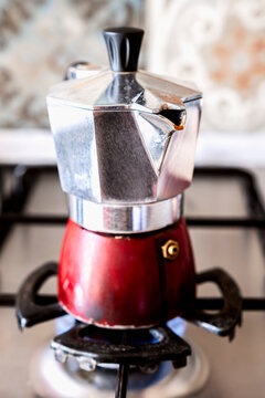 Classic Moka Pot on Gas Stove Burner Brewing Coffee