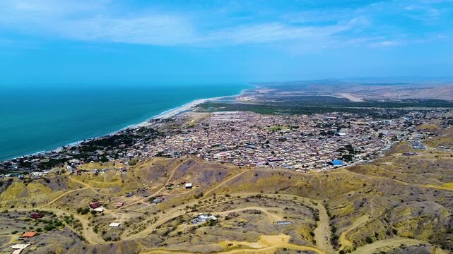 Aerial View of Ecuador Coastal Town with Pacific Ocean, Dry Hills, Urban Streets, Beachfront and Scenic South American Seaside Landscape
