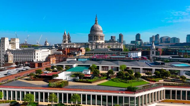 Aerial cityscape of central London featuring St. Paul&rsquo;s Cathedral, classic architecture, and modern buildings. Ideal for travel, tourism, architecture, and real estate uses