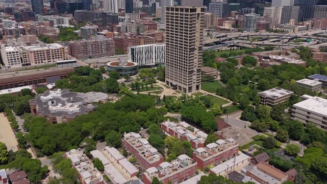 Urban landscape showing University Village neighborhood and University Hall, Circle Interchange, cityscape of Chicago, Illinois, from aerial vantage point