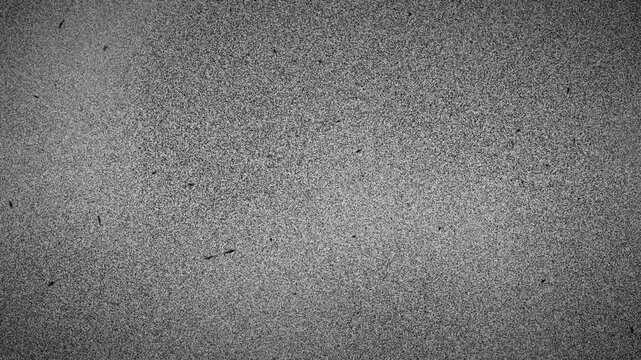Monochrome grain noise overlay background with dusty retro texture seamless loop