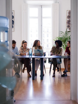 People enjoying business meeting at office 
