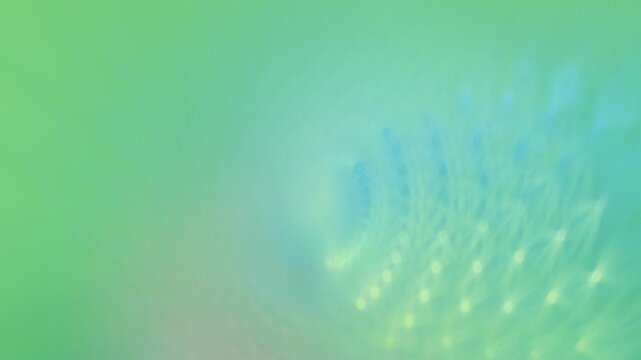 Warm golden and orange lights flow in a soft, blurred tunnel. This 3D loop has a high quality, premium look for elegant projects. 3D render motion.