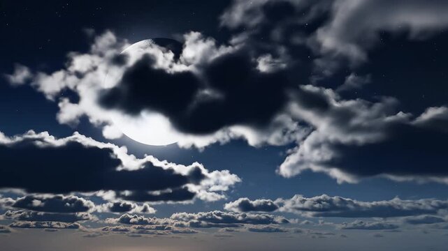 Dramatic night sky with crescent moon and dark clouds