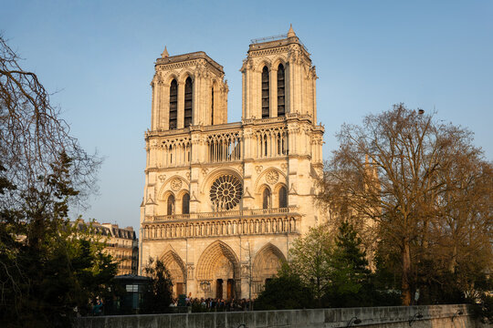 Notre-Dame de Paris cathedral facade at golden hour