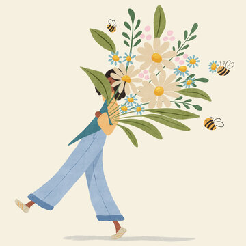 Woman walking carrying a large bouquet of flowers 