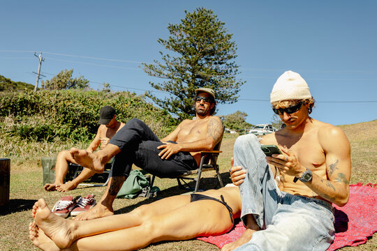 UGC three friends resting above beach on east Australia coastal trip