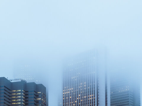 Fog Covered Downtown Office Buildings at Dawn