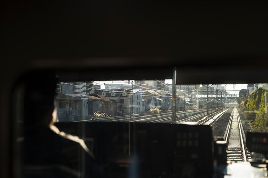 Train Driver View Along Sunlit Railway Tracks
