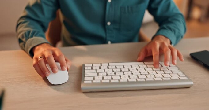 Close Up of Businessman Hands Typing on Keyboard and Using Wireless Mouse at Office Desk