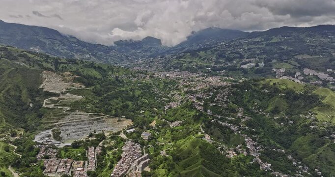 Medellin Colombia Aerial v34 flyover Comuna 13 San Javier capturing El Condor quarry site, mountains, Eduardo Santos and San Cristobal hillside neighborhoods - Shot with Mavic 3 Cine - November 2022