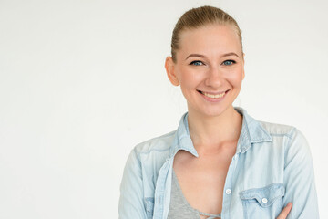Smiling woman in casual attire.