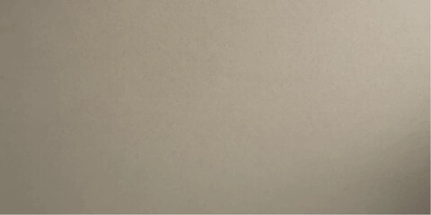 Fototapeta premium A neutral, textured surface in a muted beige hue provides a clean, uncluttered backdrop for various design applications.