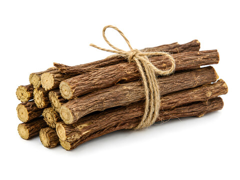A neat bundle of dried mulethi licorice roots tied with natural twine, isolated on a white background, perfect for herbal wellness and decor.