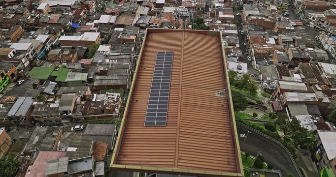 Medellin Colombia Aerial v53 birds eye view flyover El Pinal Gondola Station capturing populated hillside residential areas, panning to reveal stormy mountains - Shot with Mavic 3 Cine - November 2022