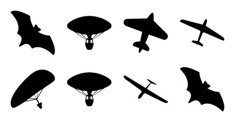 Black flying machines and bat icons set - A sleek collection of black silhouette icons depicting various flying machines and bats in a minimalist style, perfect for creative projects. © MST
