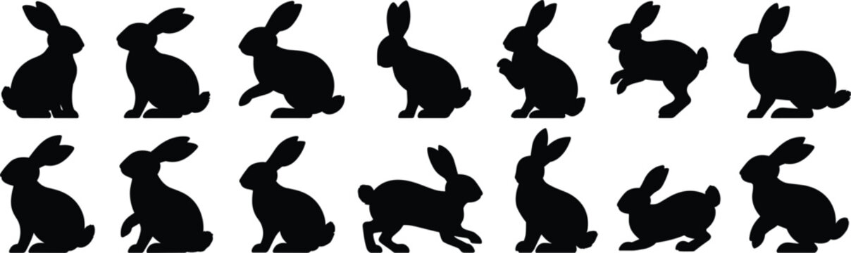 Set of black rabbit silhouettes in various sitting, jumping, and standing poses, isolated on a white background, for nature