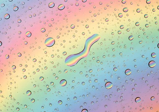 Abstract rainbow gradient background covered in clear water droplets with light refraction