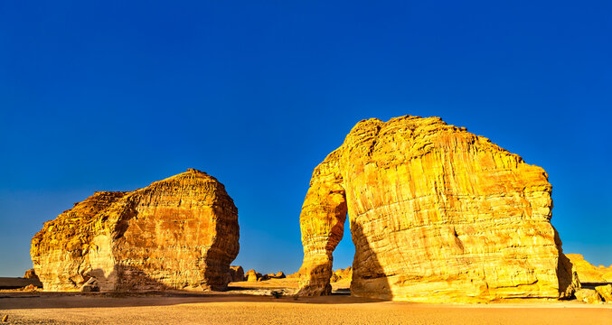 A breathtaking view of the famous Elephant Rock or Jabal AlFil, a natural geological formation in the desert landscape of Al Ula, Saudi Arabia.
