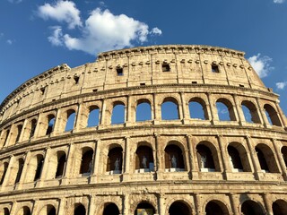 Naklejka premium Historic stone arches of the Colosseum in Rome, close-up view, Italy
