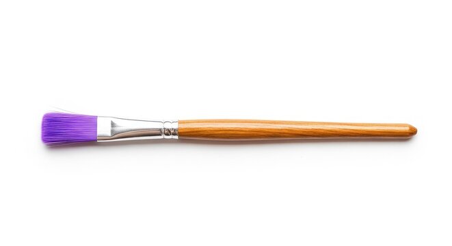 A vibrant purple paintbrush sits horizontally on a clean white background, showcasing its soft violet bristles and a sleek wooden handle, close-up, space, macro