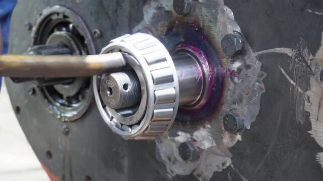 Tapered roller bearing installation on industrial shaft