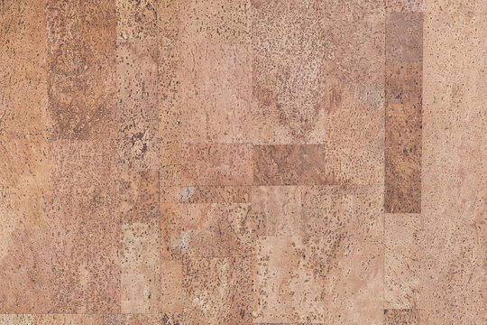 varnished surface of pink brown natural cork tile