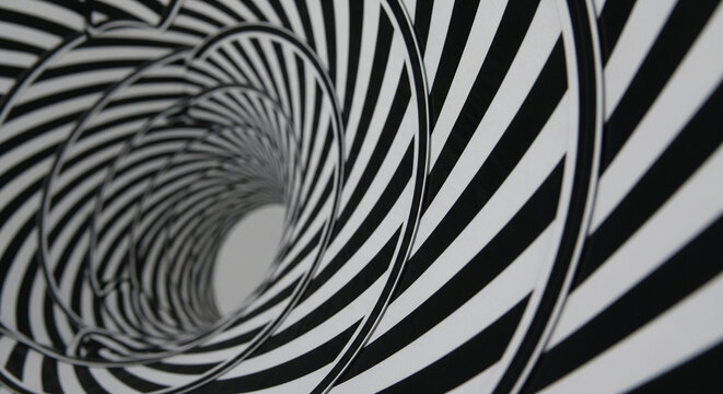 A mesmerizing optical illusion features a swirling vortex of black and white stripes, creating a powerful sense of depth and disorientation as it draws the viewer into its hypnotic spiral