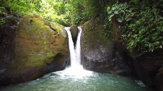 Drone view of waterfall in Costa Rican rainforest