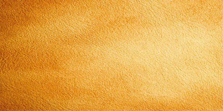 detailed texture of rich amber leather, showcasing its natural grain and subtle variations in tone, creating a warm and inviting backdrop.