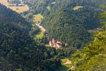 Medieval monastery Cerveny Klastor near Trzy Korony Pieniny National Park Slovakia Poland border aerial view. Scenic aerial landscape featuring historic architecture, mountains, and nature. © Anatoliy