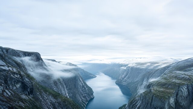 険しい岩山とフィヨルドを覆う雲 / Clouds covering steep rocky mountains and fjord (Generative AI)