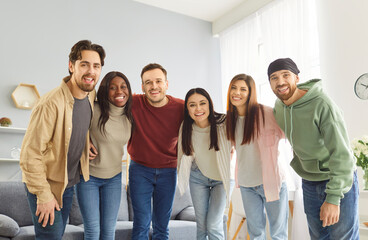 Obraz premium Friends team, happy unity common group hug, community supporting each other, following teambuilding joy and amuse, old friends and classmates reunion, coming together to enjoy friendly time 