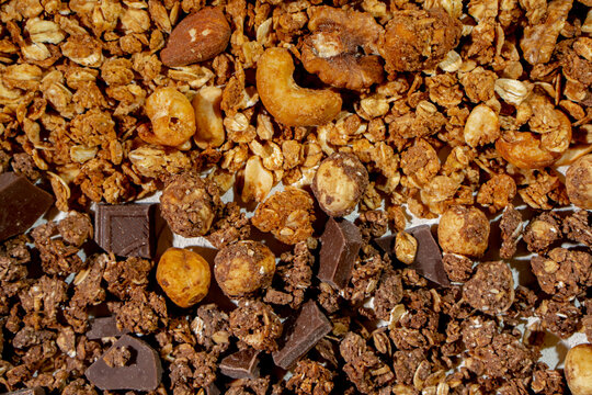 Assorted Granola with Nuts and Chocolate, Healthy Breakfast Texture Background