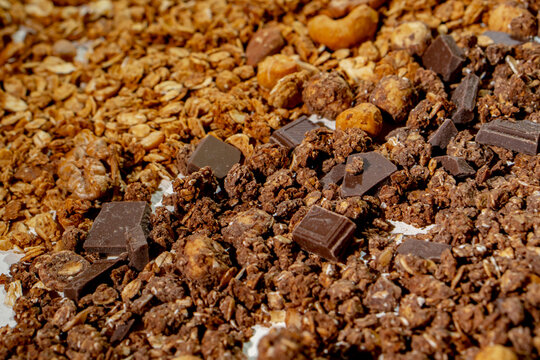 Chocolate Granola with Nuts and Dark Chocolate Pieces Close Up