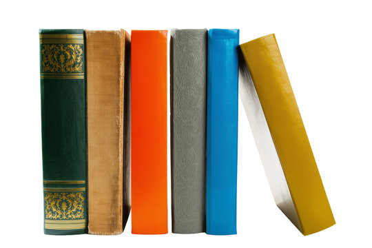 Isolated row of diverse colorful book spines, some new and some antique, neatly arranged