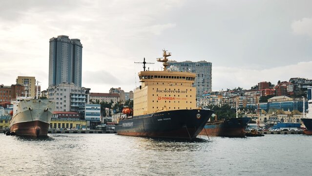 Vladivostok, Russia - August 9, 2021: Cove with ships off the coast in the city of Vladivostok.