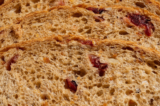 High-Resolution close-up of sliced whole grain rye bread with seeds, ultra sharp, detailed texture, macro extreme detail v3