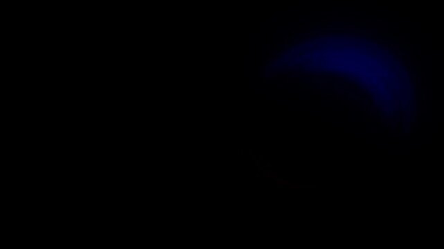 Rotating neon ovals on a black background. Stock animation with glowing circles for eye overlay in 4K. Flickering holographic glowing buttons.