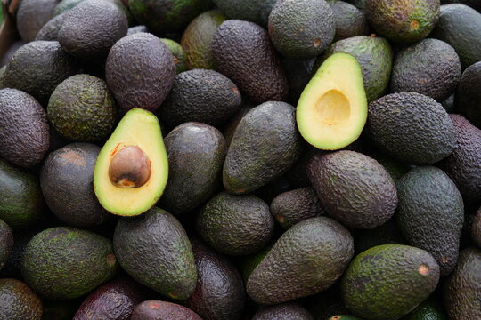 Fresh green avocados at the farmers market