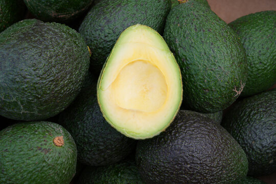 Fresh green avocados at the farmers market