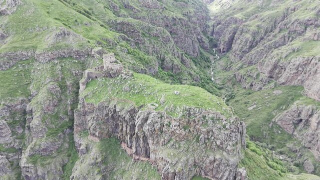 Cinematic Drone Footage of Seytan Castle Ruins on Cliff in Cildir Ardahan Province Turkey Eastern Anatolia Dramatic Landscape
