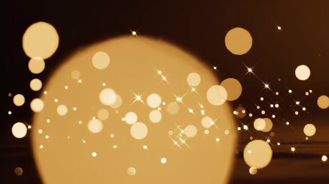Shimmering Warm Golden Bokeh Circles And Sparkling Stars Glowing On Dark Backdrop Magical Footage Of Wonder Perfect For Advertising Intro And Celebration