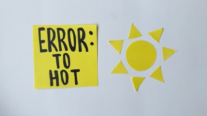 Yellow sticky note reads 'ERROR: TO HOT' beside sun cutout. Clean white background. Humorous summer heat warning. Great for tech, weather, or travel themes. Suggests overheating or extreme conditions © KARINA