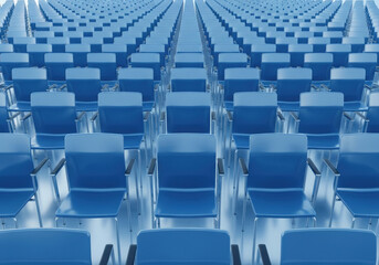 Fototapeta premium Modern blue office chairs arranged in perfect rows inside empty conference hall or auditorium creating symmetrical perspective for large events.