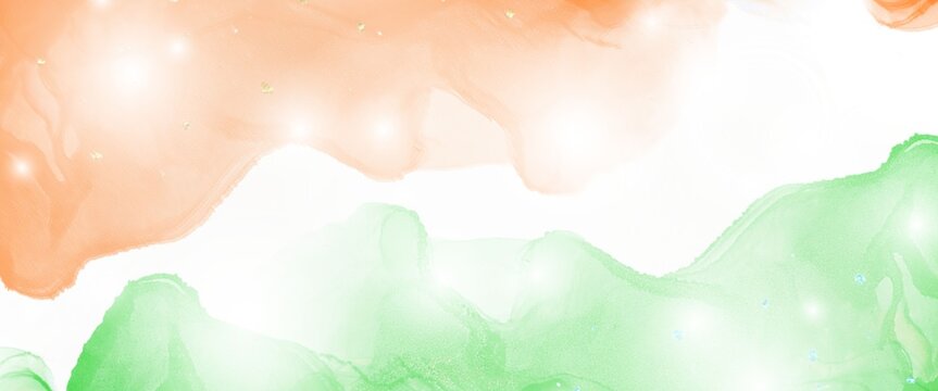 Indian independence day flag concept creating an abstract background celebrating freedom and republic with saffron and green watercolor alcohol ink strokes