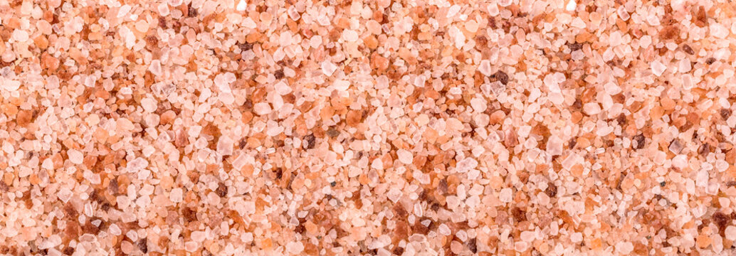 Himalayan pink salt crystals texture background creating pattern